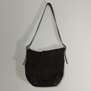 Coach Purse Black with adjustable strap.